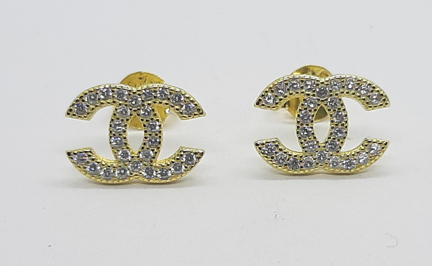 orecchini argento bagno oro giallo zirconi